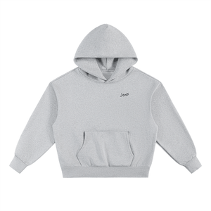Front view of light grey Sabr oversized fleece hoodie with subtle Arabic chest design