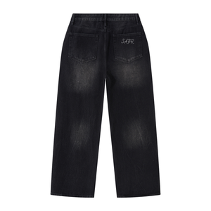 Men's vintage wash wide leg jeans in black, back view